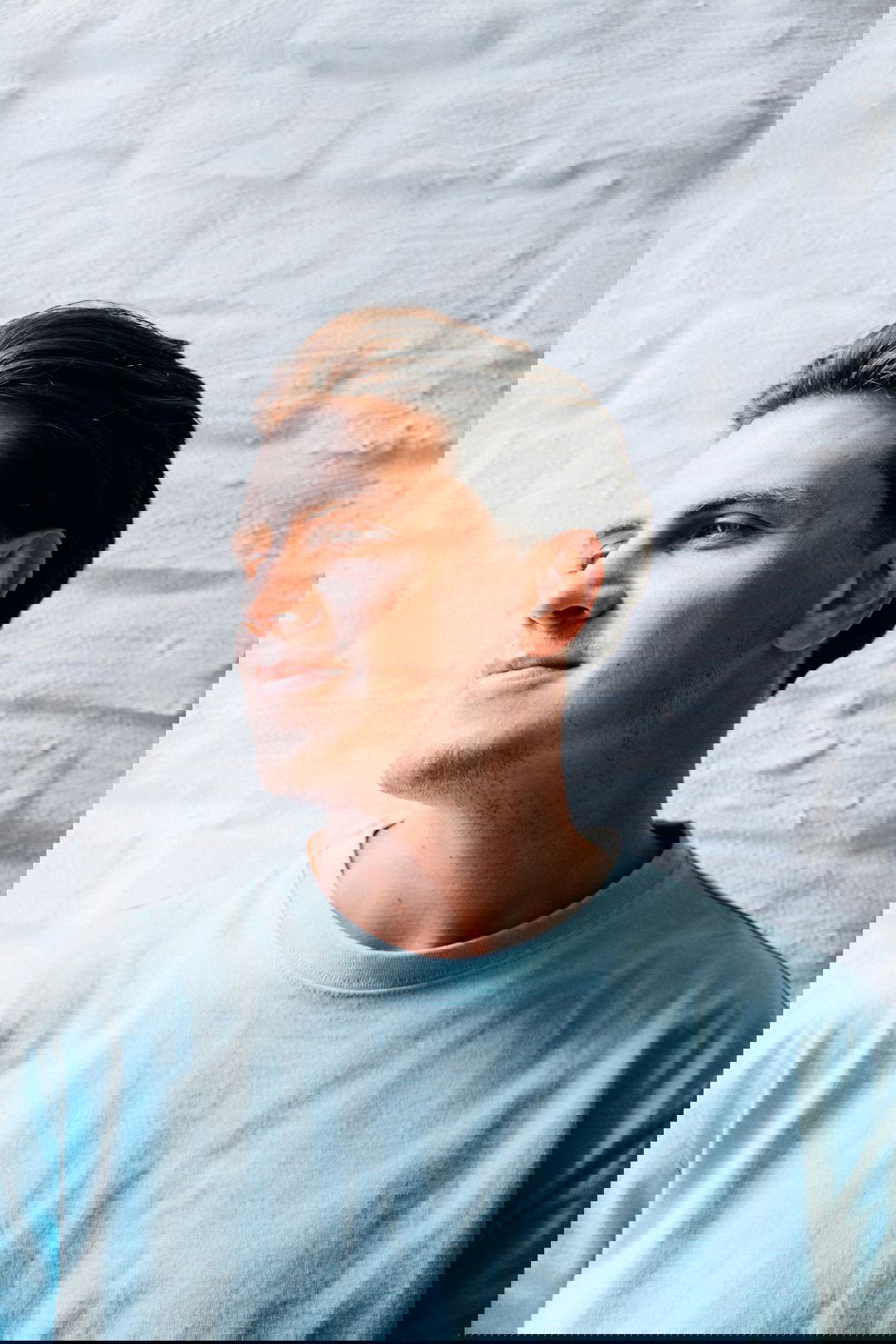 man in white crew neck shirt